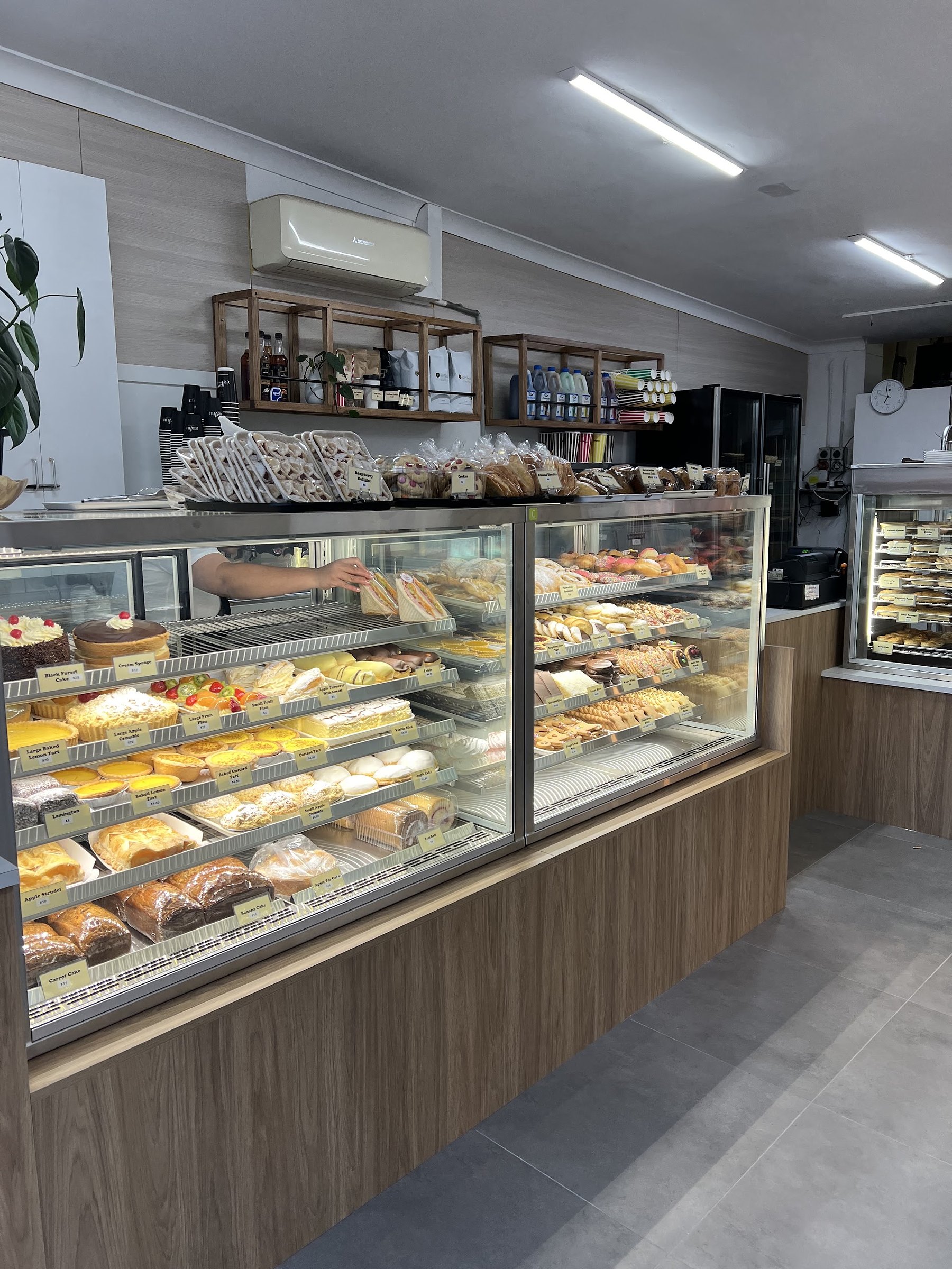 The Swiss Bell counter, full of cakes, tarts and pastries